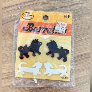 VINTAGE Goody barrettes from the 1970s featuring lion and dachshund dog shapes